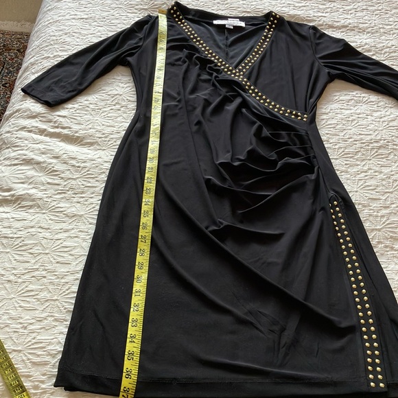 Elegant LBD w/crossover neckline & faux wrap skirt w/gold stud detail. - Picture 8 of 14